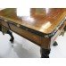 Yew Library Table with Carved Monopodium Legs